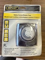 Front view of packaged Defiant Outdoor Extreme Weather Timer