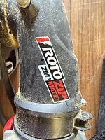Close-up of RotoZip ZM3 Mate branding on tool body
