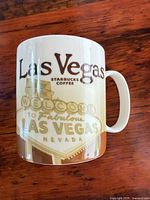 Front of mug showing Welcome to Fabulous Las Vegas sign graphic