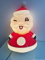 Full view of illuminated blow mold Santa lamp