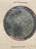 Obverse side of the corroded 1908 Canada 1 Cent coin in holder