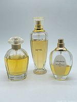 Group shot of three perfume bottles