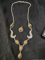 Full view of necklace and separate pendant