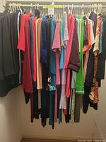 Closet rod view showing full assortment of garments on hangers