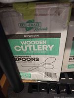 Box labeled Eco-Craze Naturals wooden disposable spoons 1000 pcs