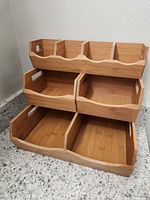 Front view showing all three tiers and compartment sizes
