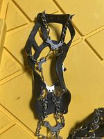Top view of one MICROspike showing elastomer harness, chains and spike plates