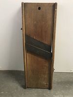 Front view of wooden mandoline slicer