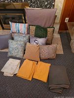 Group shot showing all pillows, sheets, blanket arranged on floor