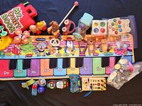 Overall lot showing all toys laid out