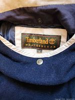 Label of unrelated Timberland garment, not part of lot