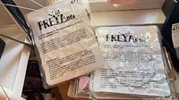 Two sealed Freyalife greenery packs on shelf