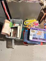 Overview of lot in tote with stationery and folders visible