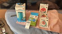 All items: Patio Shield device box, refill kit box, three bracelet packs