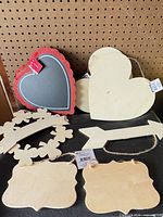 Group shot showing all six wooden cutouts and chalkboard heart
