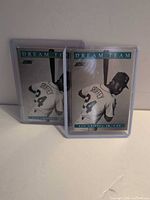 Two 1991 Score Dream Team Ken Griffey Jr. cards in sleeves, front view
