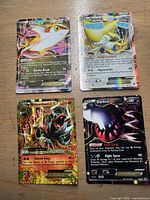 Group image showing all four EX holo cards