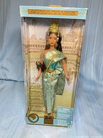 Front view of boxed Princess of Cambodia Barbie doll and accessories
