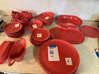 Overall lot showing plates, bowls, cups, gravy boat, butter dish, platters