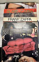Front view of stacked Frank Zappa LP jackets