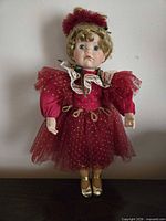 Front view of doll in full costume
