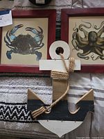Group shot showing anchor and both framed prints