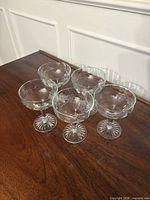 All five coupes grouped on table showing general appearance