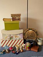 Group shot of entire lot including boxes, brass plate, Sanyo component, vase, wallet, fish, timer, egg cups