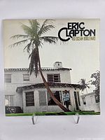 Front cover showing title, artist, house photo