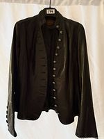 Front view of black leather Danier blazer with buttons
