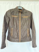 Front view of brown leather jacket
