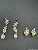 Front view of both earring pairs