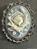 front view of oval cameo brooch pendant