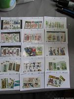 Overview of 16 stock cards with assorted GB mint stamp sets