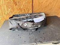 Carry bag closed showing logo
