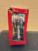 Front view of boxed pair of nutcrackers