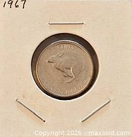 Coin reverse with rabbit design and denomination visible