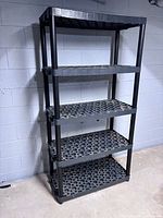 Full view of five-shelf plastic shelving unit