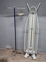 Ironing board, garment rack, and hangers together