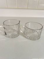 creamer and sugar bowl side by side showing overall design