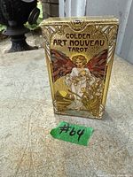 Front view of Golden Art Nouveau Tarot boxed deck