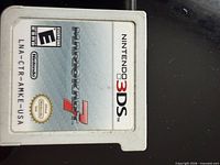 Front of Mario Kart 7 cartridge showing label and code LNA-CTR-AMKE-USA