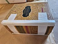 Front cover and spine with extensive white tape repairs