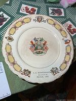 Full view of commemorative plate showing design and inscription