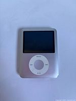Front view showing screen and click wheel