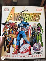 Front cover of Avengers: The Ultimate Guide hardcover book