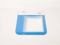 Front view of sealed IKEA Hylkje mirror showing blue border and mirror glass