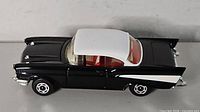 Left side view of black and white Corgi Chevrolet Bel Air model