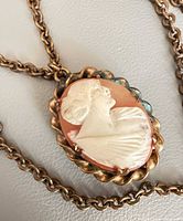 Close-up of cameo locket front relief