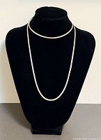 Full view of necklace on display bust